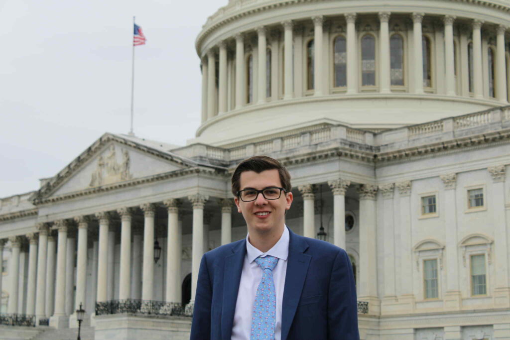 Young Democrat on the steps of the Capitol building.